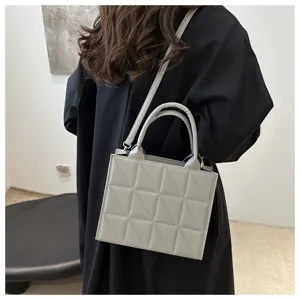 Chic grey quilted square shoulder bag for women, elegant versatile tote and crossbody design.