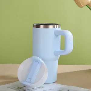 Taza termica de acero inoxidable azul claro con asa, comodo vaso de cafe para viaje.
