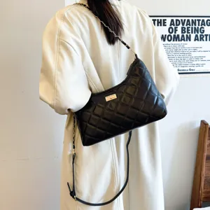 Women's quilted chain shoulder bag, stylish underarm dumpling handbag, black faux leather.