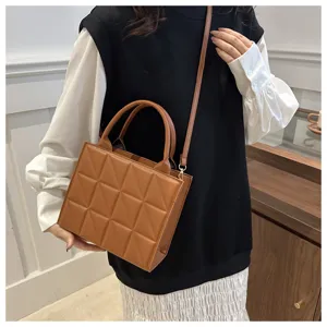 Stylish brown quilted square handbag for women, chic fashion crossbody and tote bag daily use.