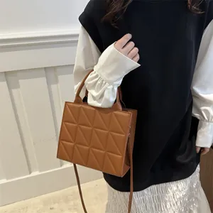 Stylish brown quilted PU leather tote handbag with shoulder strap for women fashion daily use