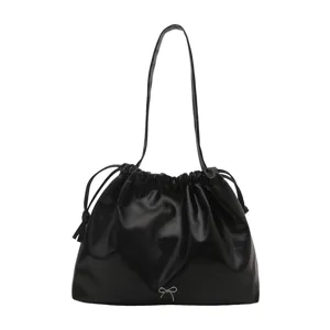 Black soft leather shoulder bag for women, stylish drawstring bucket bag with bow