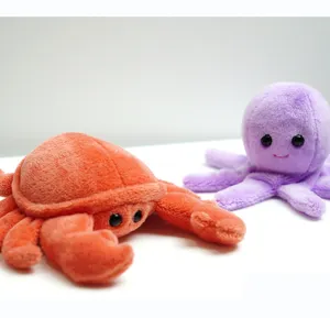 Cute marine animal plush toy detail view featuring soft octopus and crab dolls for fun play.