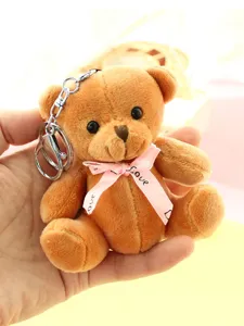 Mignon porte-clés en peluche ours brun avec ruban rose, adorable pendentif de sac main.