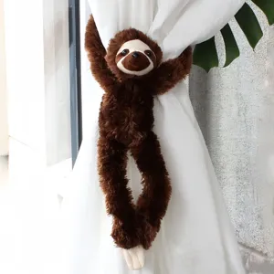 Sloth plush curtain tieback detail shot, brown cute animal hanging doll for home decor and window.