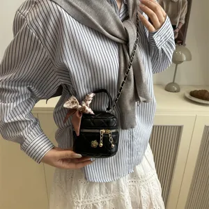 Trendy quilted chain mini box bag for women, stylish crossbody handbag with chic design.