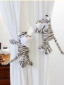 Cute plush tiger curtain tiebacks, soft fabric cartoon animal curtain holders for home decor.