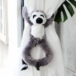 Lemur plush curtain tieback detail shot, cute animal hanging room decor accessory.