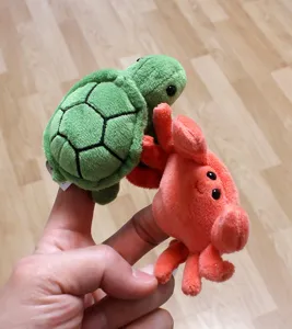 Plush ocean animal finger puppets set, cute turtle and crab toys for kids and parent play.