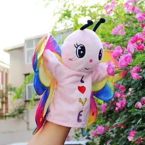 Cute pink butterfly hand puppet plush toy with colorful rainbow wings for kids interactive play.