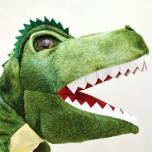 Mignon jouet de marionnette à main dinosaure en peluche verte avec détails réalistes.