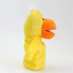 Marionnette à main canard jaune en peluche dessin animé jouet pour enfants histoires interactives.