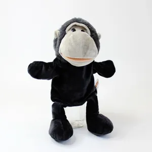 Marionnette à main en peluche noir et gris avec longues jambes et bouche mobile pour enfants.
