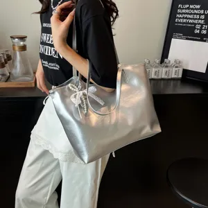 Fashion silver metallic tote bag for women, large capacity shoulder bag with pearl bow.