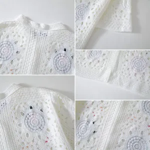 Close-up detail of white crochet knit hollow-out short sleeve top with circular pattern.