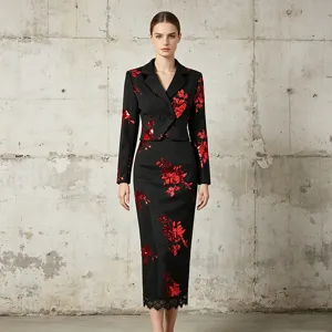 Exquisite black sequin floral two-piece suit detail featuring cropped blazer and lace midi skirt.