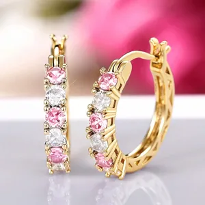 Exquisite gold-plated U-shaped hoop earrings featuring pink and white cubic zirconia.
