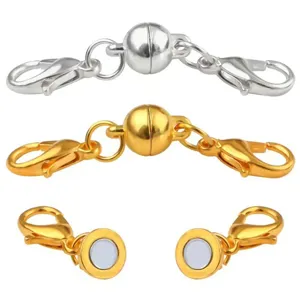 Magnetic jewelry clasps detail shot, gold and silver color-retaining DIY bracelet connectors.