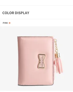 Close-up detail of the pink short women wallet featuring a cute bow metal buckle and chic tassel.