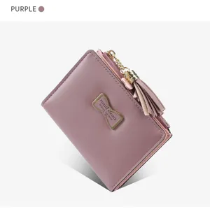 Women short wallet cute PU leather bi-fold purse with tassel bow pendant purple color.