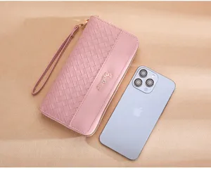 Pink woven long wallet for women with wrist strap and zipper closure, stylish phone purse.