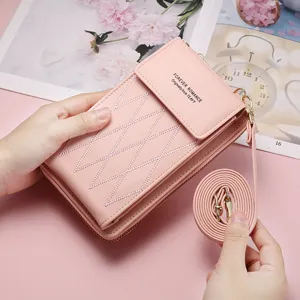 Pink PU leather cross-body phone bag for women, chic diamond stitched solid wallet.