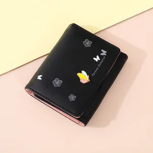 Black short women's wallet trifold design with butterfly metal charm and cute floral print.