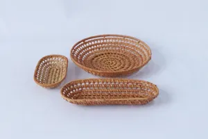Detailed view of hand-woven rattan hollow storage baskets, natural texture for home decor and snacks.