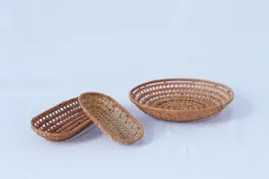 Handmade woven rattan hollow fruit plate, tea towel tray and snack storage basket dish.