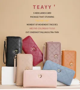 Women long double zipper wallet large capacity fashion clutch purse with wrist strap and heart decor.