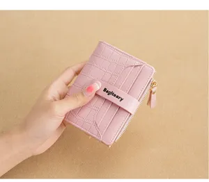 Pink short two-fold women wallet with crocodile pattern and handy zipper coin pocket.