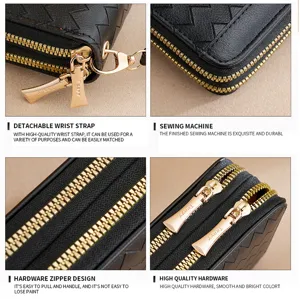 Black woven leather women wallet with double gold zippers and wrist strap detail view.
