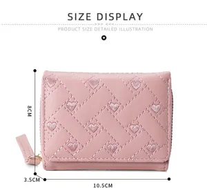 Detailed view of women's short quilted heart embroidered wallet showing size dimensions.