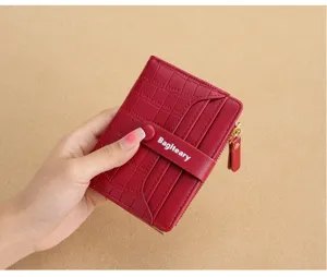 Red short wallet detail view, PU leather card holder with multi slots and snap closure.