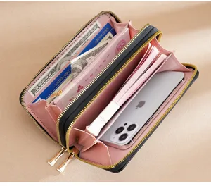 Women's long double zipper wallet large capacity clutch purse with multiple card slots.