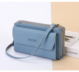 Femme bleu sac bandouliere telephone portemonnaie double fermeture eclair detail vue