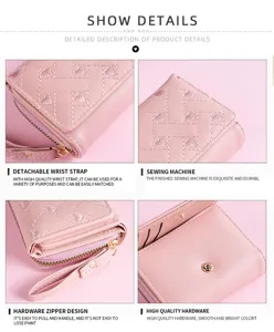 Pink short wallet detail, heart embroidery pattern, delicate metal zipper and wrist strap.