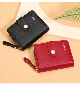 Detailed view of short women wallet with zipper, snap closure, and wrist strap in dual colors.