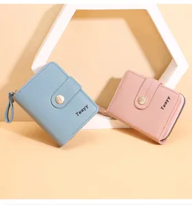 Women short PU leather wallet with snap button and zipper coin purse card holder detail view.