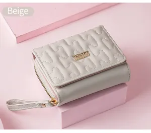 Beige kurze Damen Geldbörse Detail, mit Wellensteppung und praktischem Reißverschluss.