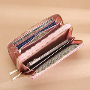Pink women long double zipper wallet large capacity clutch purse with phone holder for use.