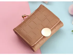 Stylish brown crocodile pattern short folding wallet with metal kiss lock and button.