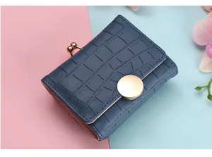 Close-up detail of the compact short foldable women wallet with cute kiss-lock and button.