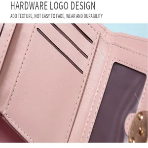 Pink women's short wallet card slot interior detail close-up view showcasing hardware design