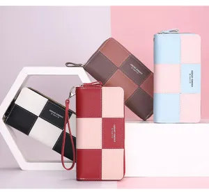 Lange dames portemonnee met rits en polsband kleurblok ontwerp stijlvol dagelijks accessoire