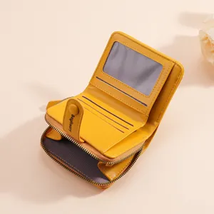 Yellow women short wallet with multiple card slots zipper coin pocket and clear ID window.
