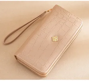 Women long double zipper wallet crocodile pattern PU leather clutch bag with wrist strap.