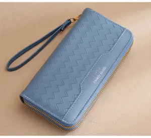 Women long wallet blue PU leather clutch purse with wrist strap and double zipper design.