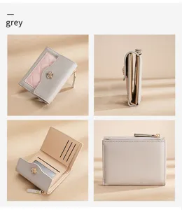 Vue détaillée du portefeuille court gris pour femme avec fentes pour cartes et fermeture.