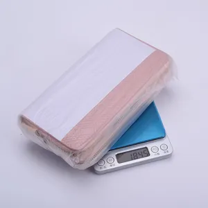 Pink long double zipper wallet detail view, large capacity clutch with elegant textured finish.